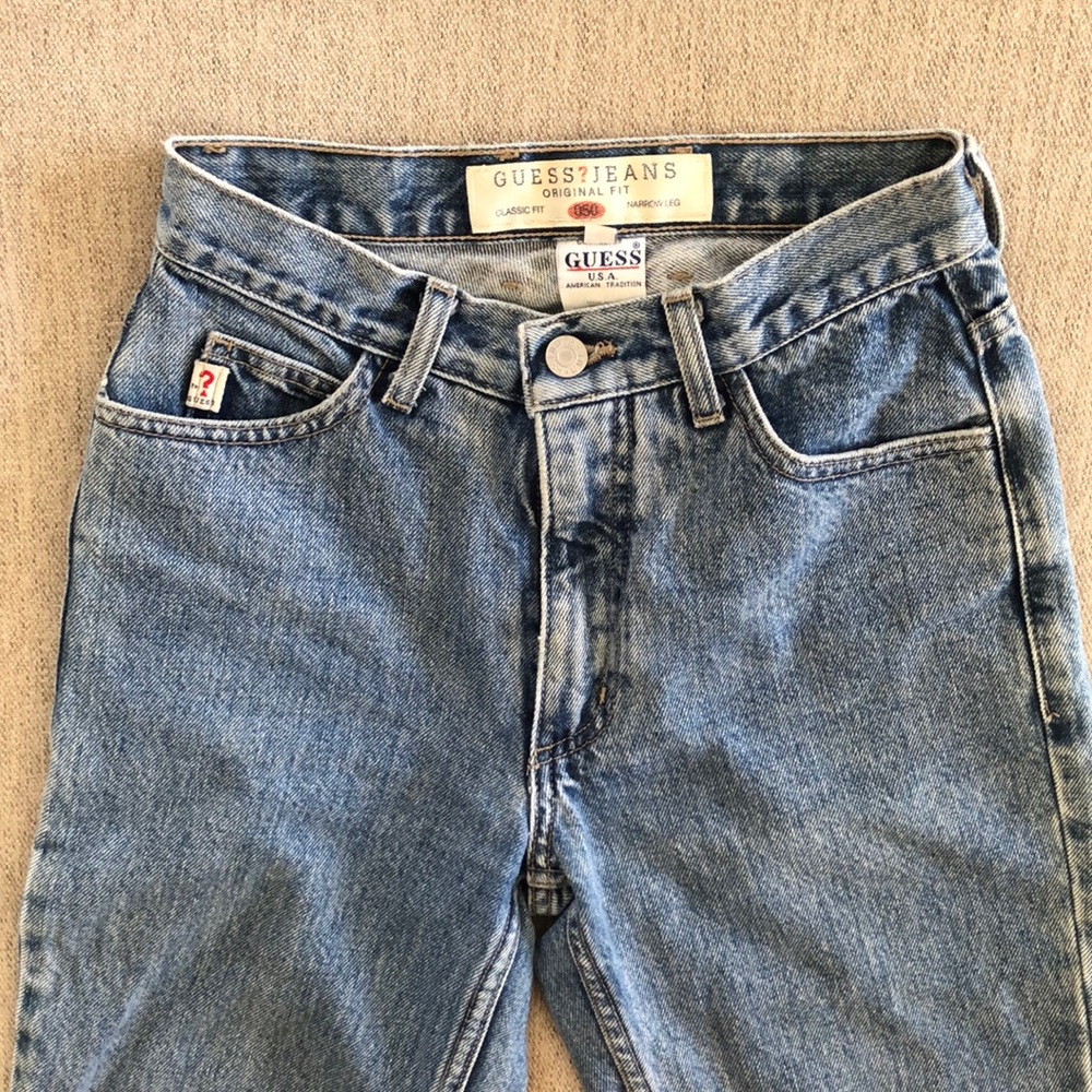 Vintage Guess mom jeans with a classic denim hue